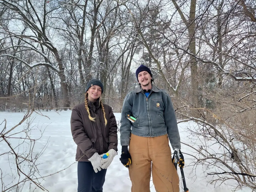 people in woods in winter